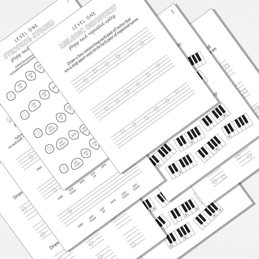 A spread of music theory worksheets shown on a neutral colored background.