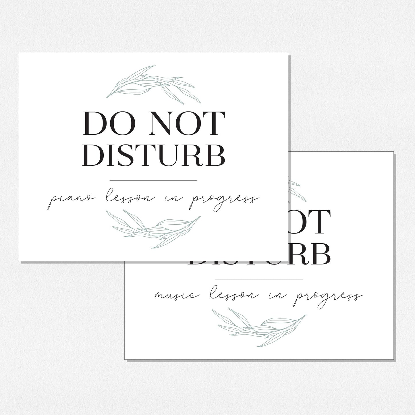 Two overlapping paper prints. The top print reads 'DO NOT DISTURB' with 'piano lesson in progress' below, and the bottom print reads 'DO NOT DISTURB' with 'music lesson in progress' below. Decorated with pale green willow leaf illustrations, arranged on a neutral colored background.