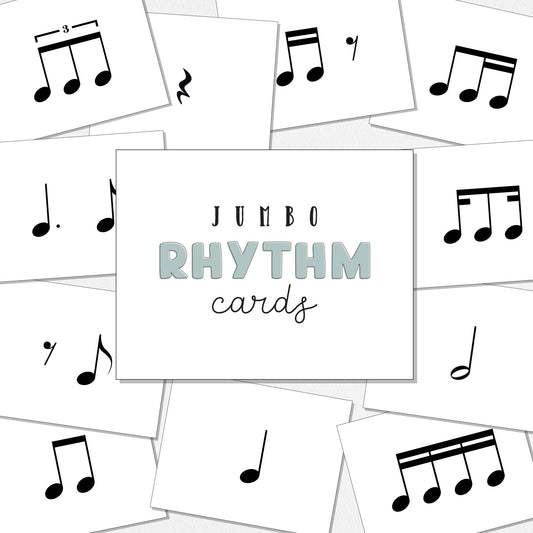 A set of white rhythm cards featuring black musical notes and a central card that reads 'JUMBO RHYTHM CARDS' in black and light green text, shown with several overlapping cards on a neutral colored background.