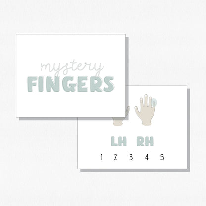 The cover card and one example card for the "Mystery Fingers" flashcards. Shown on a neutral colored background.