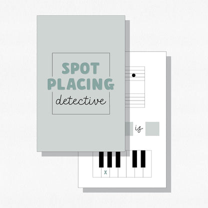 Two cards from a set of music theory flashcards called "Spot Placing Detective." Shown on a neutral colored background.