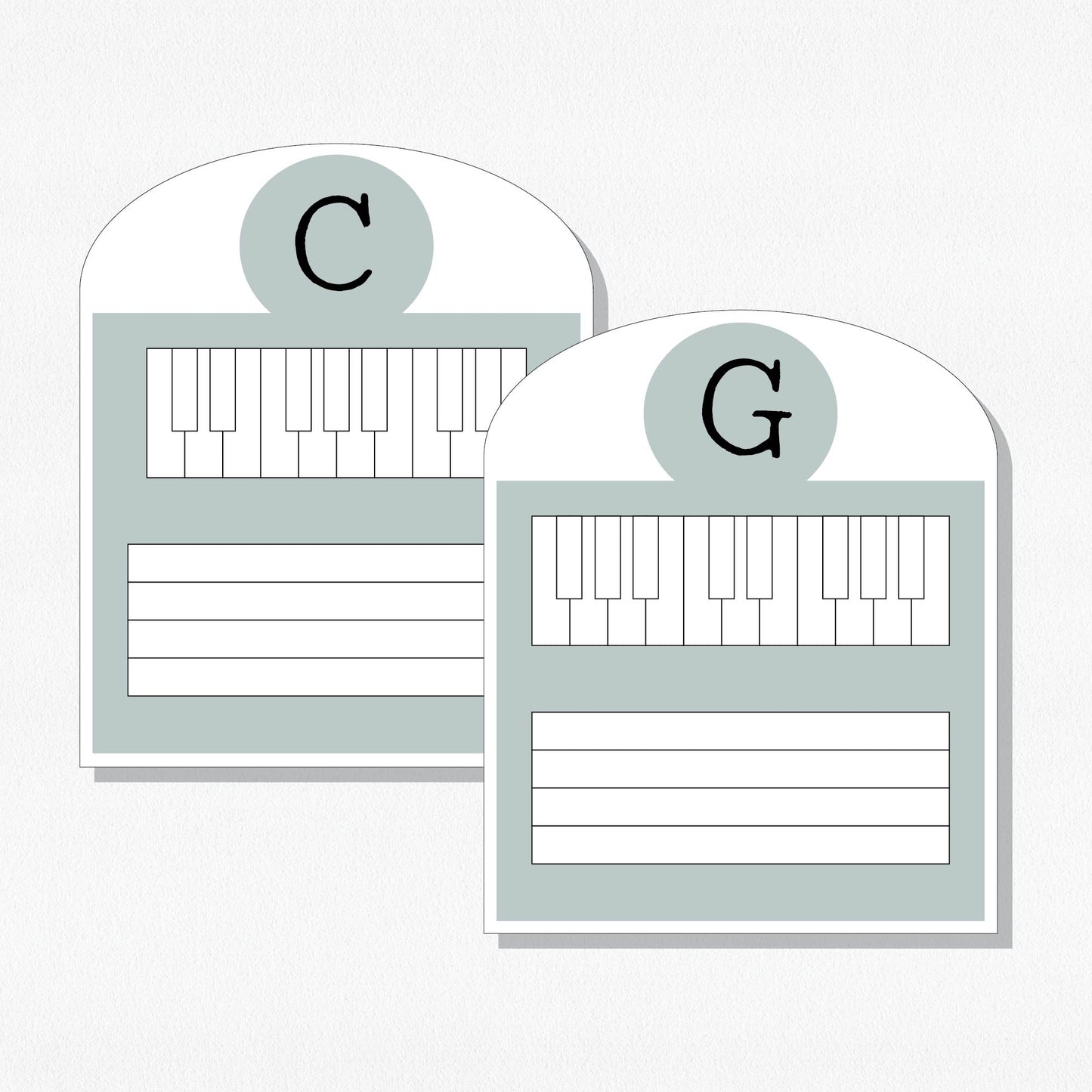 Two music cards with a keyboard and staff. Shown on a neutral colored background.