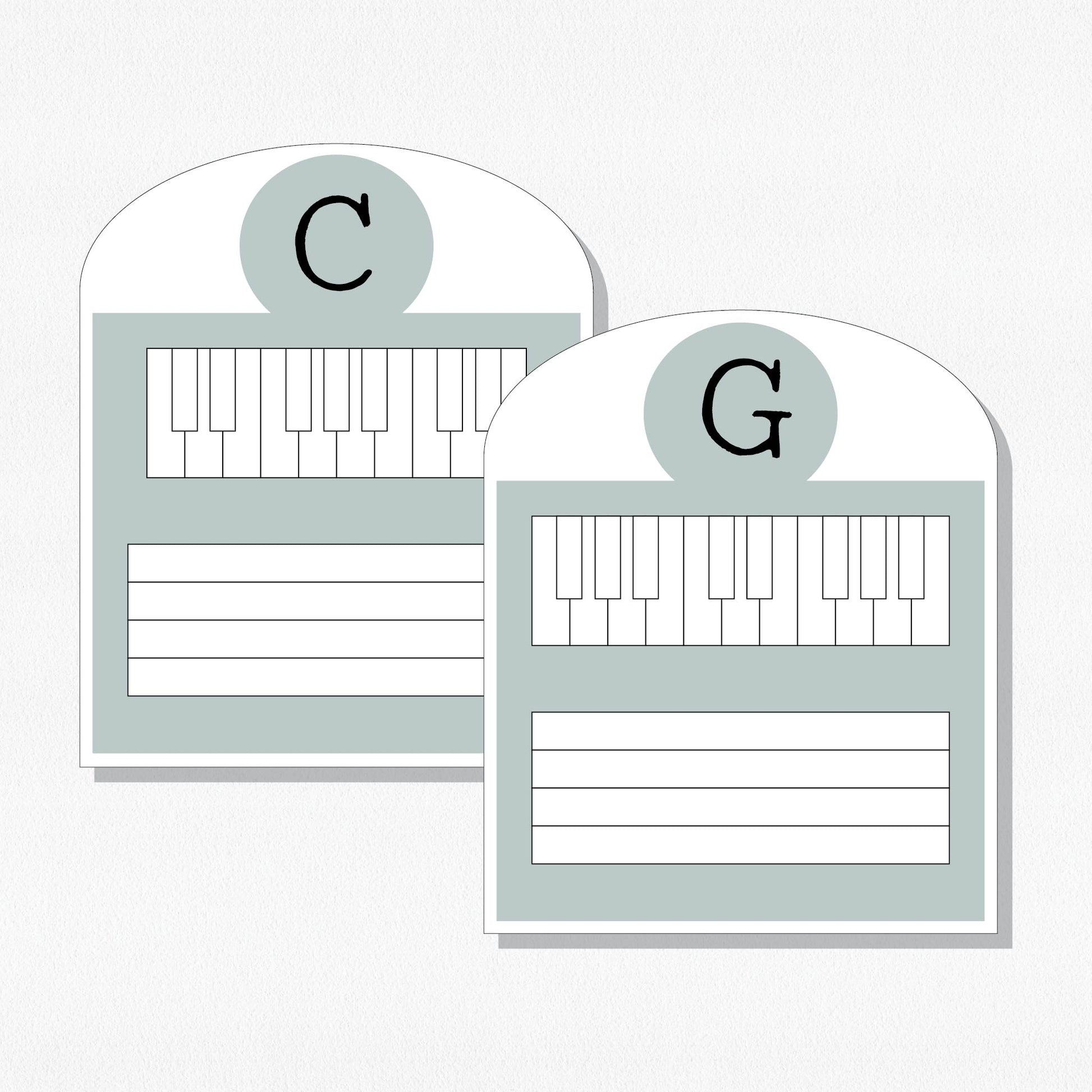 Two music cards with a keyboard and staff. Shown on a neutral colored background.