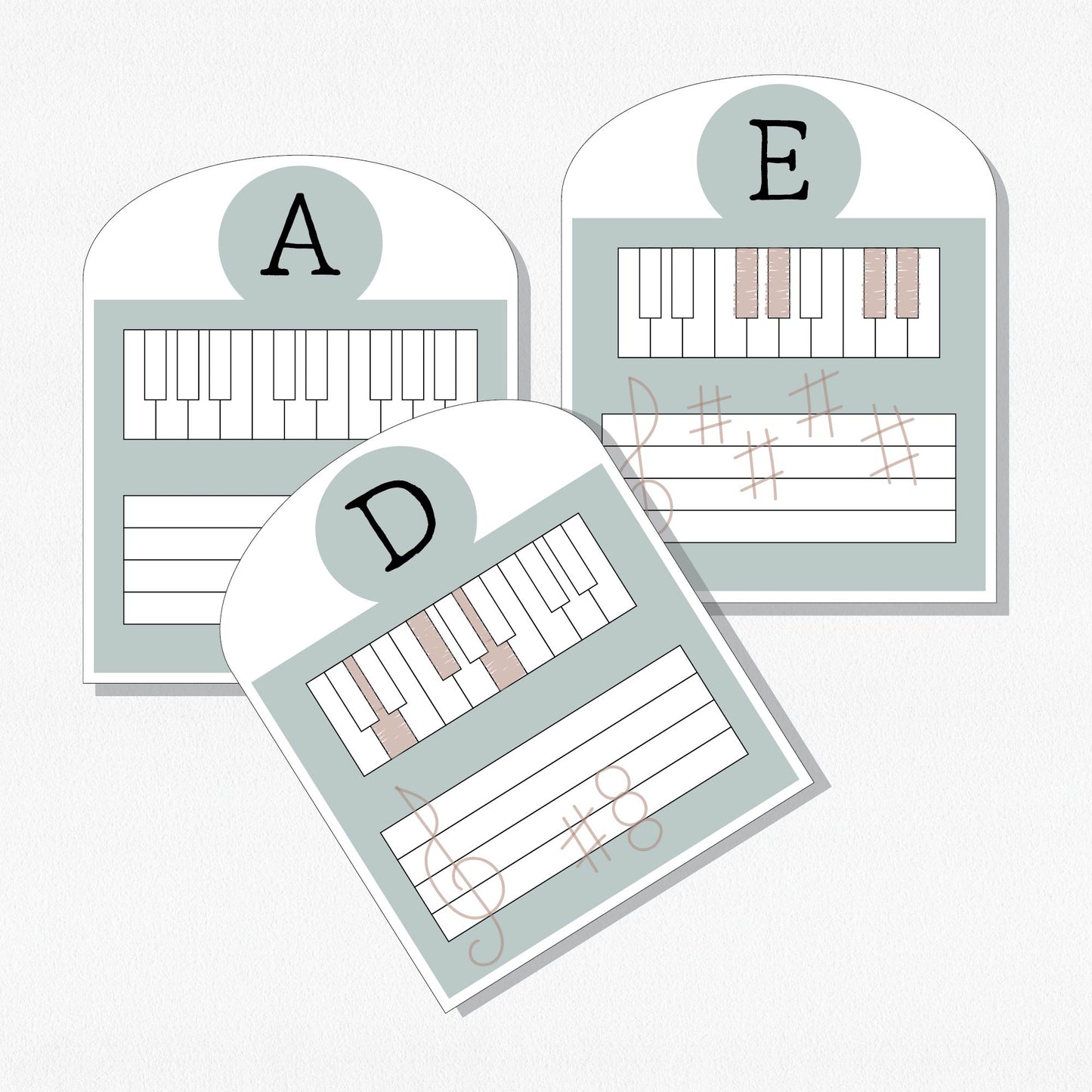 Three music theory cards with keyboards and staffs. Shown on a neutral colored background.