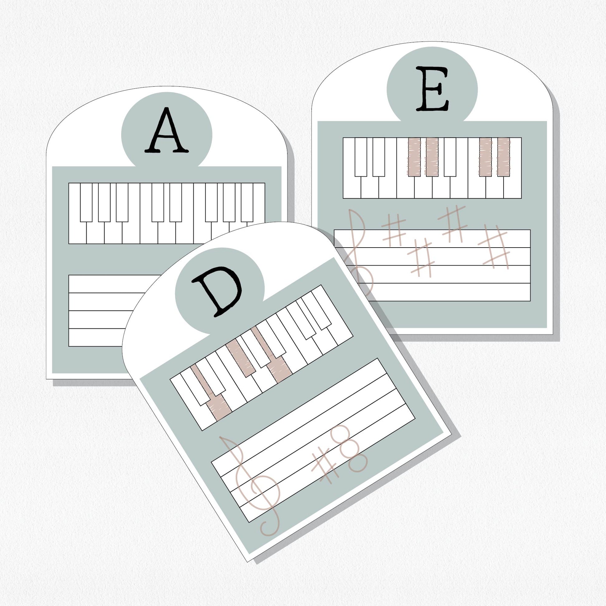 Three music theory cards with keyboards and staffs. Shown on a neutral colored background.