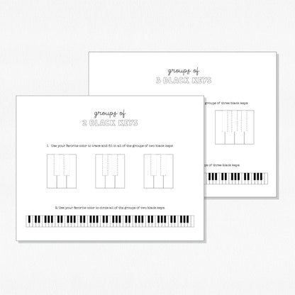 Photo of music theory worksheets on a neutral colored background.