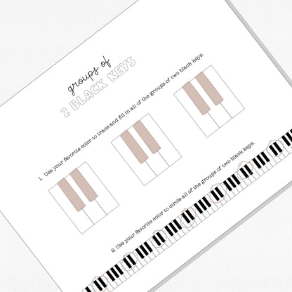 Photo of a music theory worksheet on a neutral colored background.